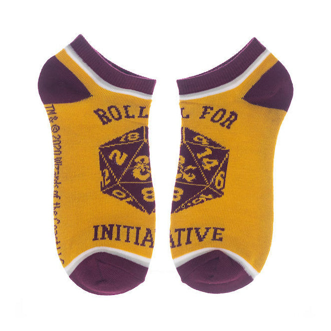 Close-up of a pair of gold D&D socks with 'Roll for Initiative' and a D20.
