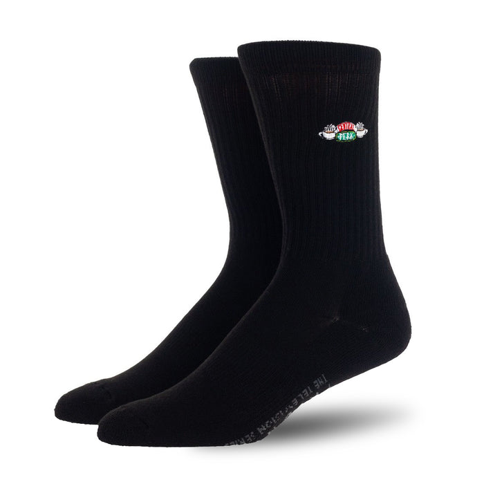 Lifestyle shot: Two pairs of black Friends socks displayed against a white background.