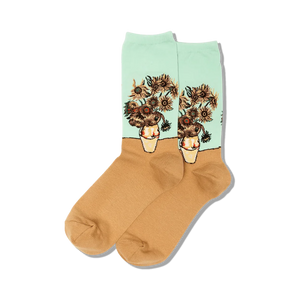 Pair of crew socks featuring Van Gogh's Sunflowers.  Mint green and tan, with a detailed image of sunflowers in a vase.