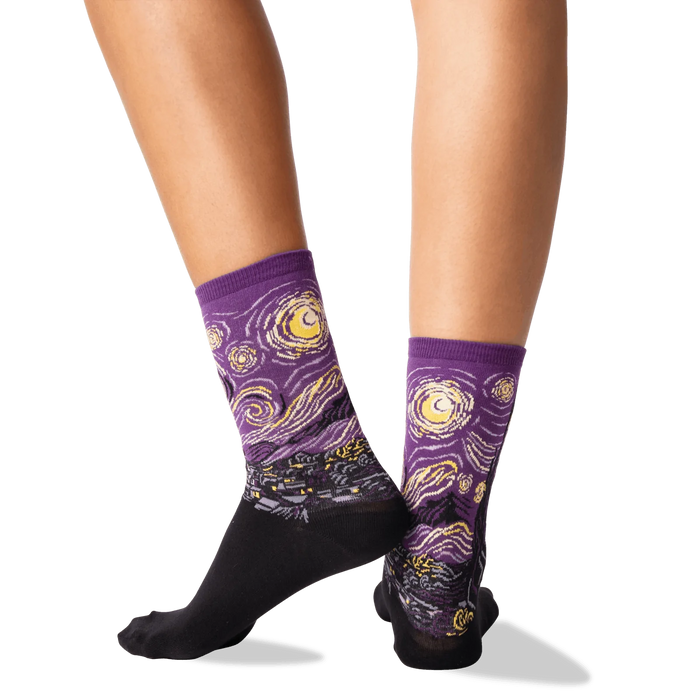 Back view of a person wearing purple Van Gogh's Starry Night socks, showcasing the sock's fit and design.