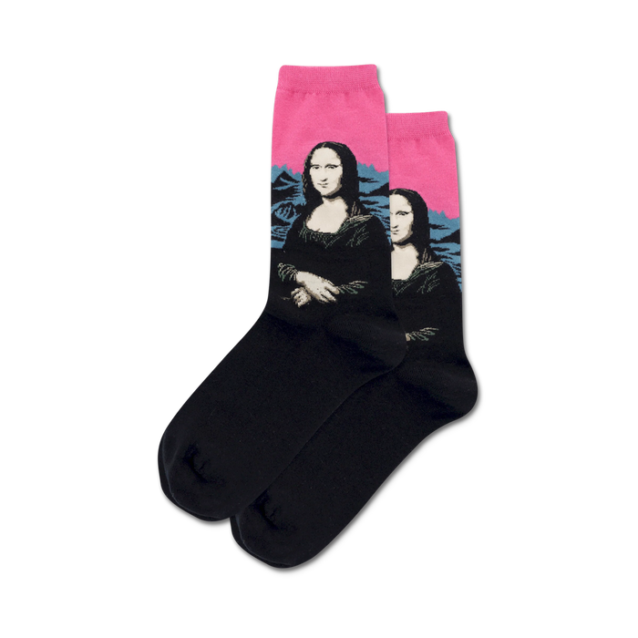 Close-up of black crew socks with Mona Lisa art; the background is hot pink.