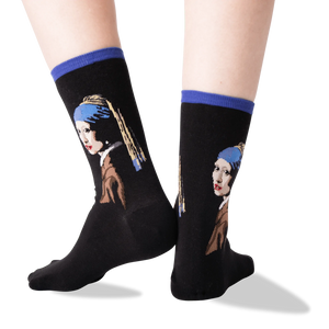 Back view of the 'Girl With A Pearl Earring' socks on a person's legs, showing the sock's fit and design details.