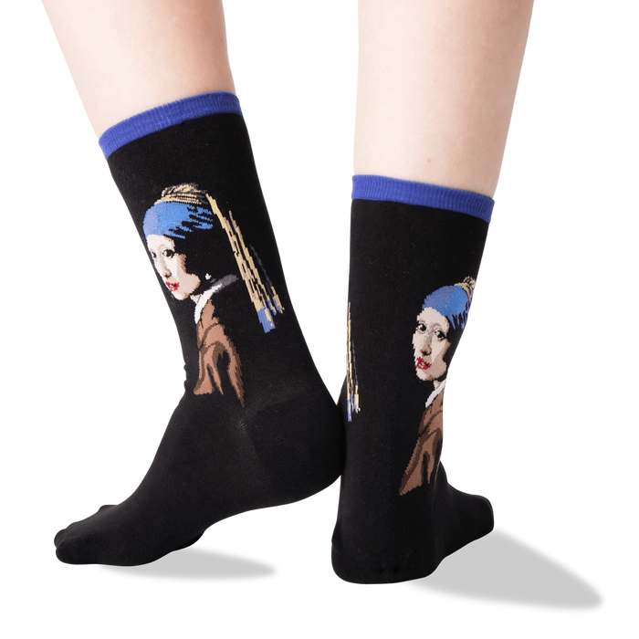 Back view of the 'Girl With A Pearl Earring' socks on a person's legs, showing the sock's fit and design details.