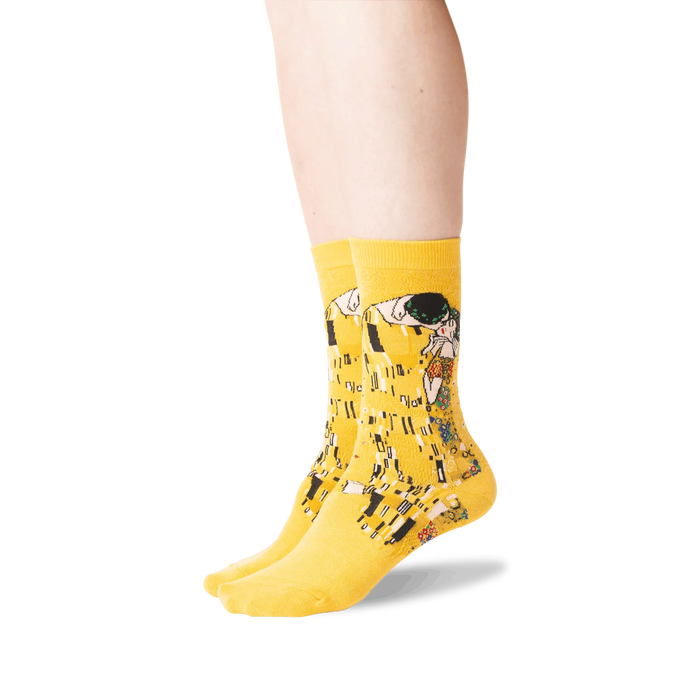 Close-up shot of Klimt's The Kiss socks on a person's legs, showing detail and fit.