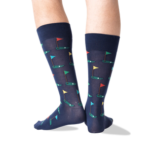 Back view of Golf Navy socks on a model's legs, showcasing the full pattern from a different angle.