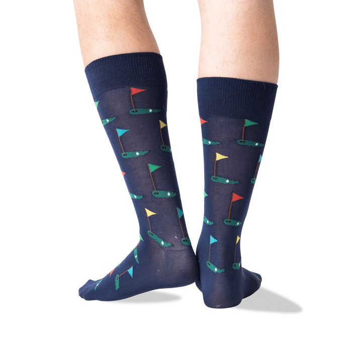 Back view of Golf Navy socks on a model's legs, showcasing the full pattern from a different angle.