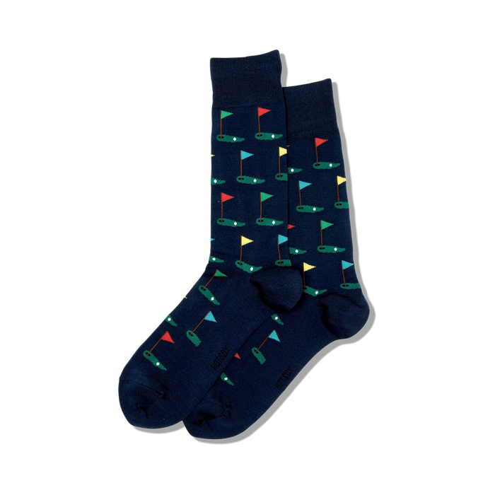 Pair of navy blue crew socks with a repeating pattern of colorful golf flags on putting greens.