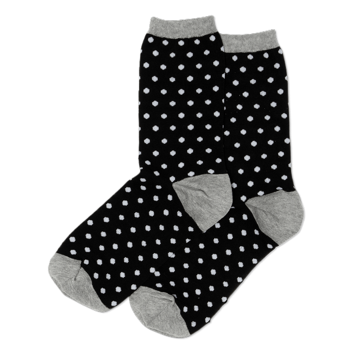Pair of black crew socks with small white polka dots. Grey cuffs, heels, and toes are visible. }}