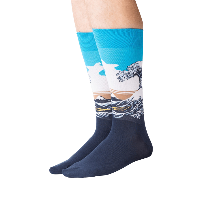 Lifestyle shot of model wearing Hokusai's Great Wave socks, showcasing the fit and design on legs.