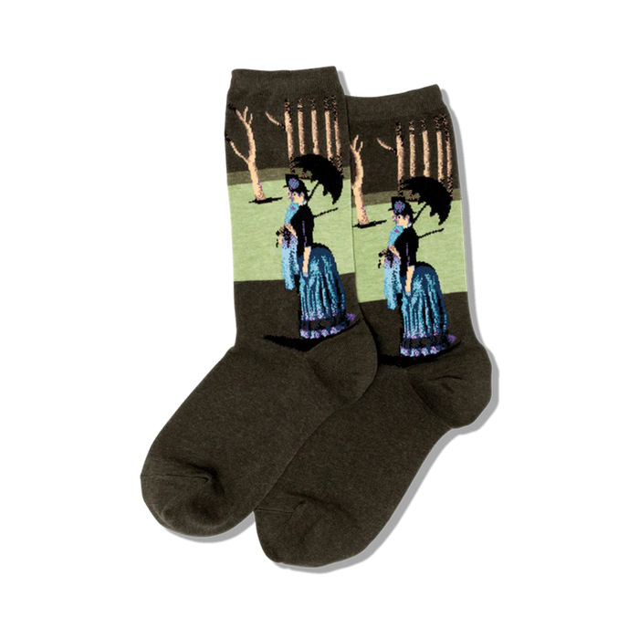 Pair of olive green crew socks displaying Seurat's A Sunday Afternoon. The design features women in blue dresses with parasols under pale green trees. }}
