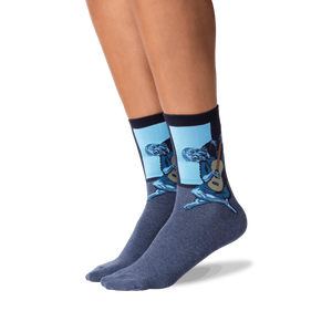 Lifestyle photo showing Picasso's Old Guitarist socks on a person's legs, showcasing how the socks look when worn.