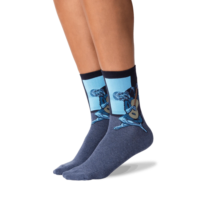 Lifestyle photo showing Picasso's Old Guitarist socks on a person's legs, showcasing how the socks look when worn.