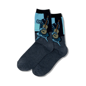 Pair of crew socks in dark gray with a vibrant blue and black image of Picasso's Old Guitarist. The artwork is prominently displayed on the sock's upper part.
