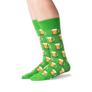 Flat lay showing a pair of green beer mug socks.