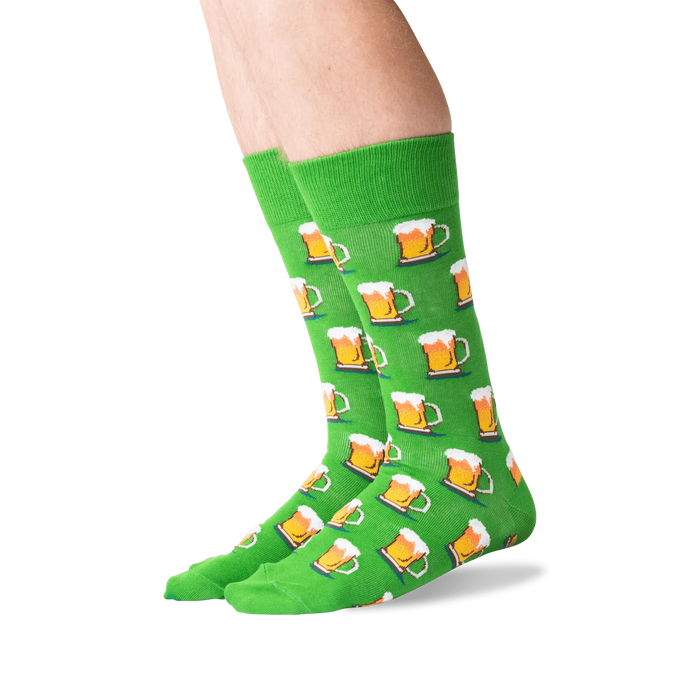Flat lay showing a pair of green beer mug socks.
