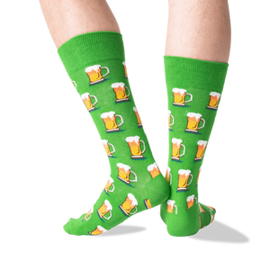 Close-up detail shot of green beer mug socks, showing the pattern.