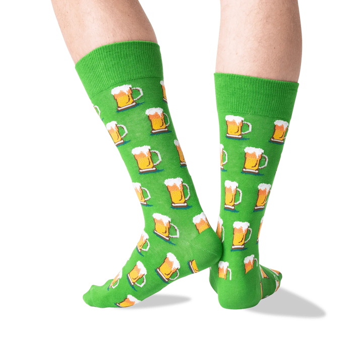 Close-up detail shot of green beer mug socks, showing the pattern.