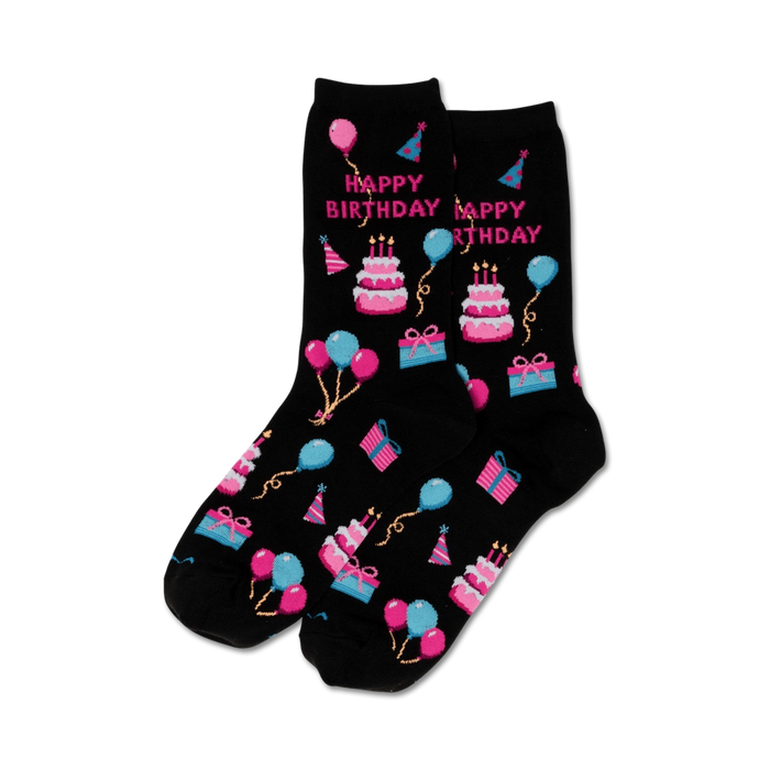 Pair of black crew socks with a fun 'Happy Birthday' theme.  Features pink, blue, and white pixelated cakes, balloons, and presents.