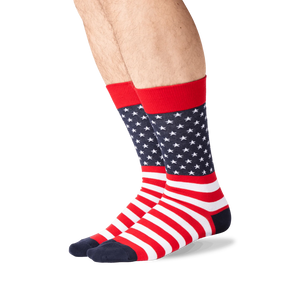Lifestyle shot showing the American Flag socks on a person's legs. The socks are red, white and navy.