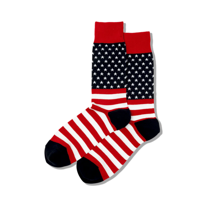 Pair of crew socks in red, white, and navy blue.  The socks feature a design replicating the American flag, with stars and stripes.