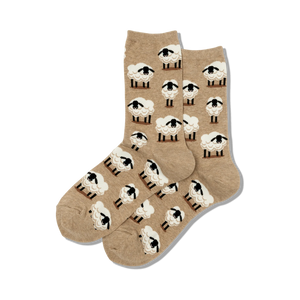 Pair of tan crew socks with a repeating pattern of adorable little white sheep with black faces.