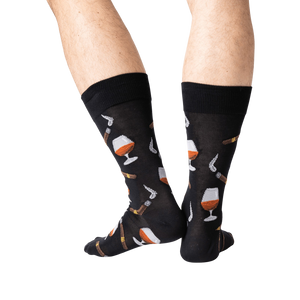 Back view lifestyle shot of a man's legs wearing the navy Cognac and Cigars socks.