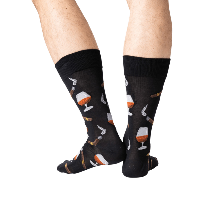 Back view lifestyle shot of a man's legs wearing the navy Cognac and Cigars socks.