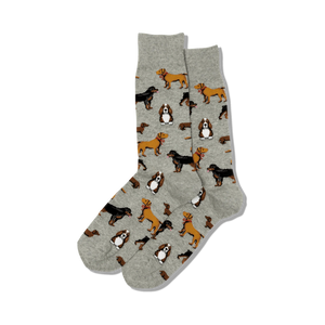 Pair of crew socks in light grey with repeating pattern of various dog breeds in brown and tan.