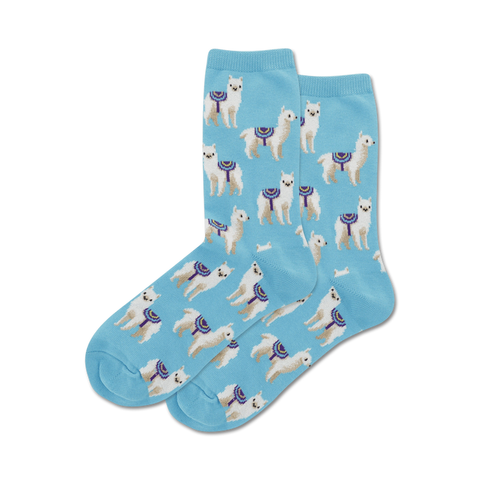 Close-up of light blue crew socks with a repeating pattern of white llamas.