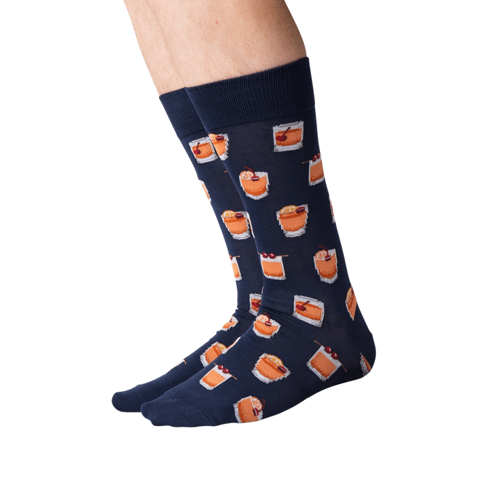 Back view of navy blue Old Fashioned cocktail socks on a person's legs.