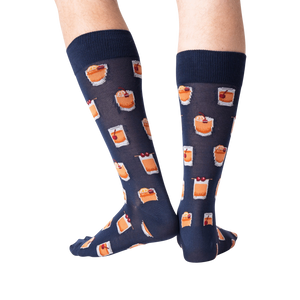 Flat lay image showing a pair of navy blue Old Fashioned cocktail socks.