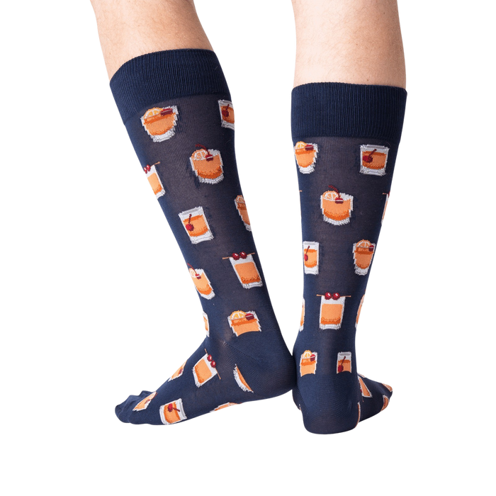 Flat lay image showing a pair of navy blue Old Fashioned cocktail socks.