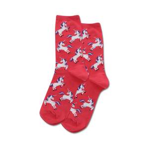 pink crew socks with galloping unicorns in white with purple manes and tails. 