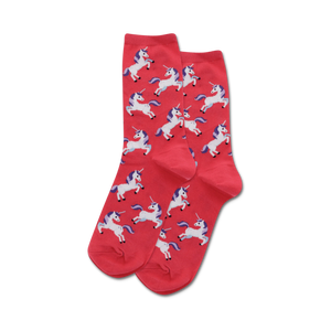 Close-up of coral crew socks with a pattern of white unicorns with purple manes and horns.