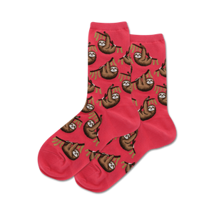 Pair of pink crew socks featuring a repeating pattern of brown sloths hanging from green branches.