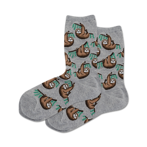 Lifestyle shot showing a pair of gray crew socks with a sloth pattern on a neutral background.