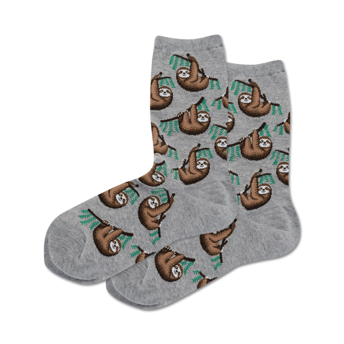 womens gray crew socks with a pattern of sloths hanging from green branches.  