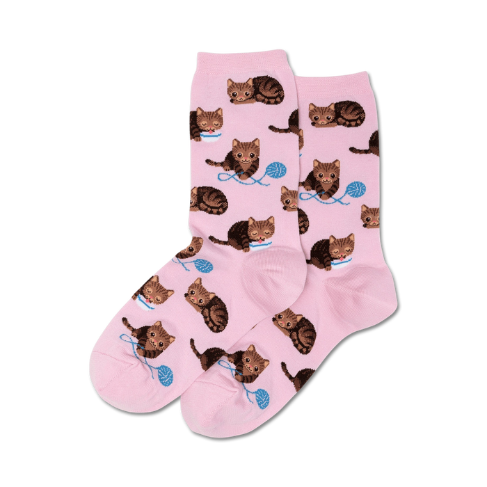 Pink crew socks with a repeating pattern of brown cats and yarn; shown as a pair.