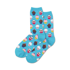 Pair of crew socks in teal blue with a repeating pattern of colorful cupcakes.