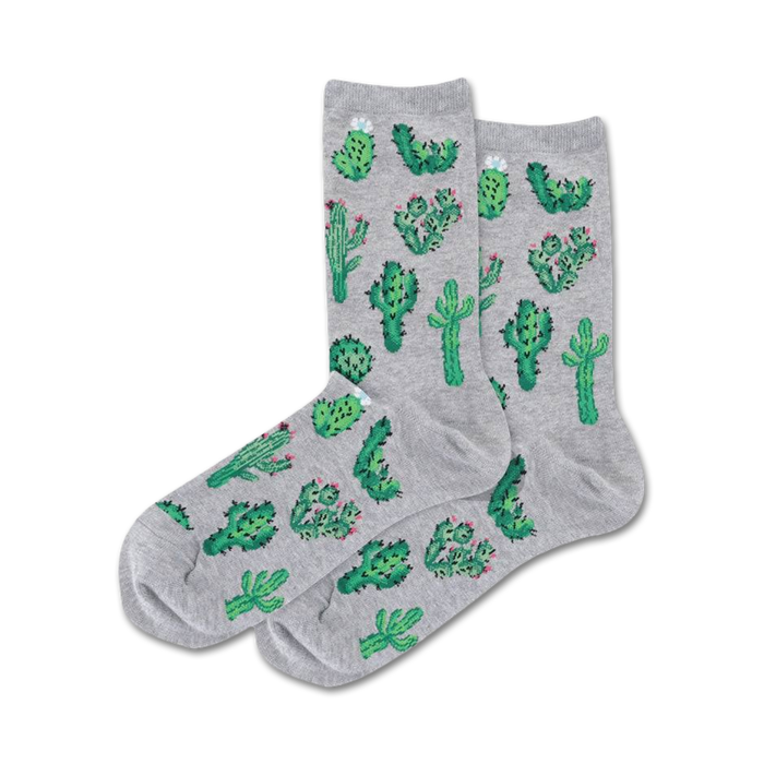 gray women's crew socks with green cacti of various sizes. some cacti have flowers.   