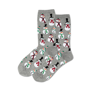 Pair of crew socks, gray with repeating snowman design. Snowmen wear hats and scarves in red, green, and white.