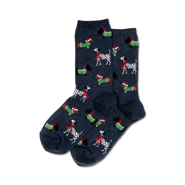 Close-up of a pair of navy blue crew socks with the same Christmas dog design as the red pair.