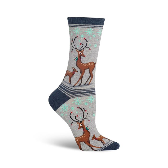 Crew socks in grey, blue, and brown featuring a festive design of reindeers with antlers and snowflakes. }}