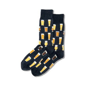 Pair of crew socks on black background. The socks have a pattern of various beer glasses in yellow and brown on a dark navy background.