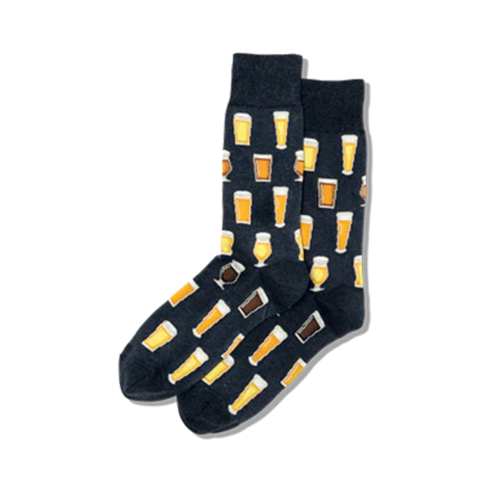 Pair of crew socks on black background. The socks have a pattern of various beer glasses in yellow and brown on a dark navy background.