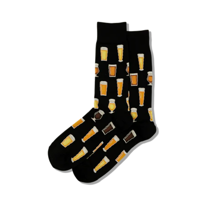 Lifestyle photo showing the socks on a person's feet. The socks' beer glass pattern is visible