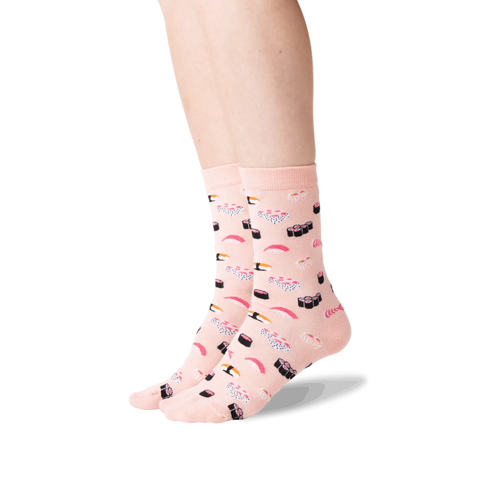 Close-up of a person wearing a pair of light pink sushi socks.