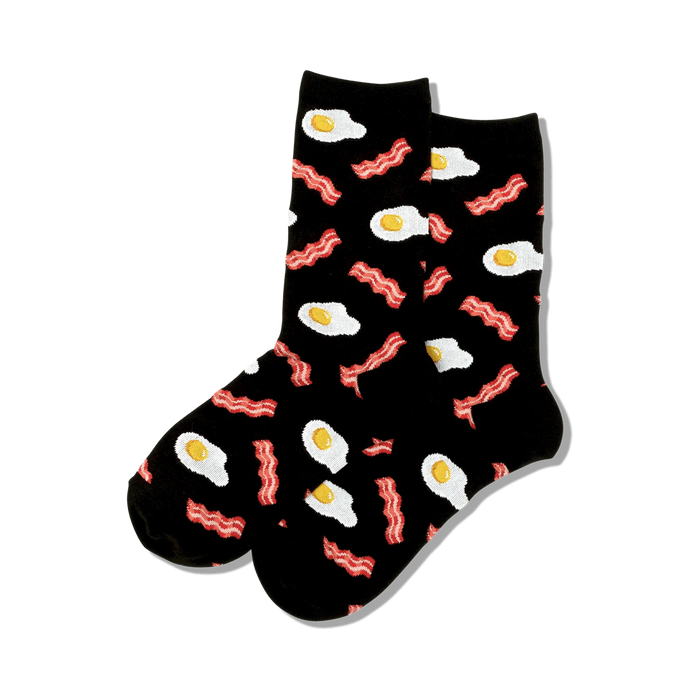 Pair of black crew socks with a fun pattern of fried eggs and bacon. Red, white, and black. }}