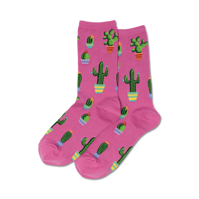 Pink crew socks with a repeating pattern of potted cacti in various colors and sizes.