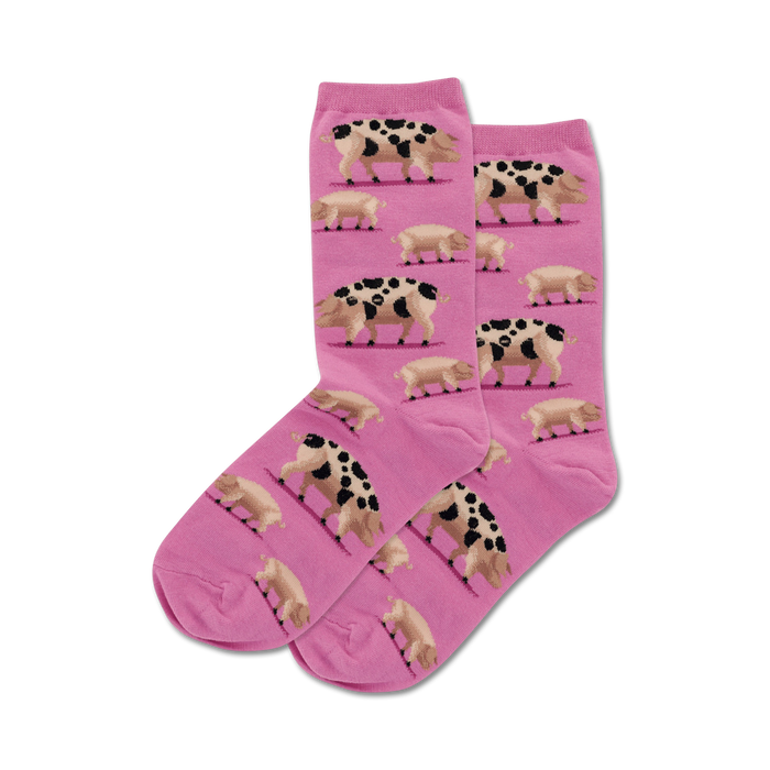 novelty crew socks for women featuring a pattern of pink, brown and black spotted pigs.    }}